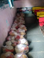 Distribution of foodgrain at Kalechiwadi Neral